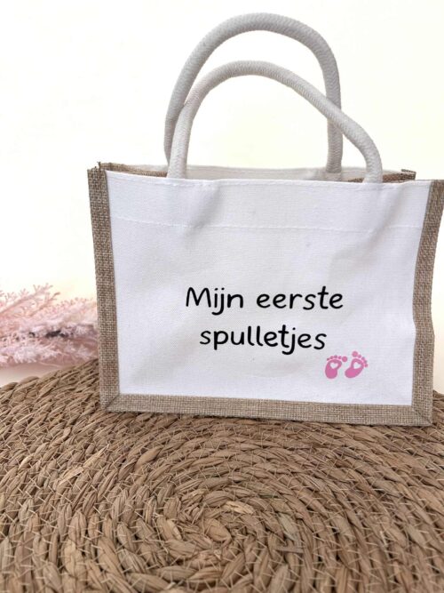 Tasje met de tekst mijn eerste spulletjes.